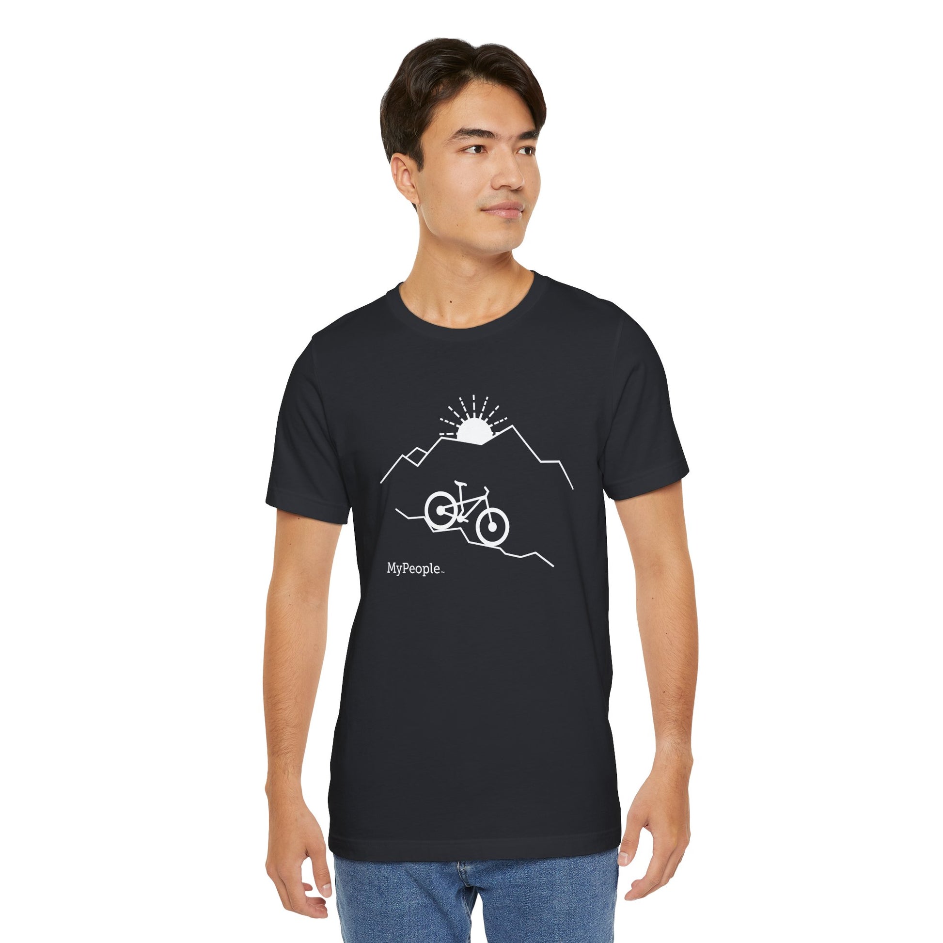 Person wearing a unisex t-shirt showing the front view with the MyPeople Mountain Biking line illustration.
