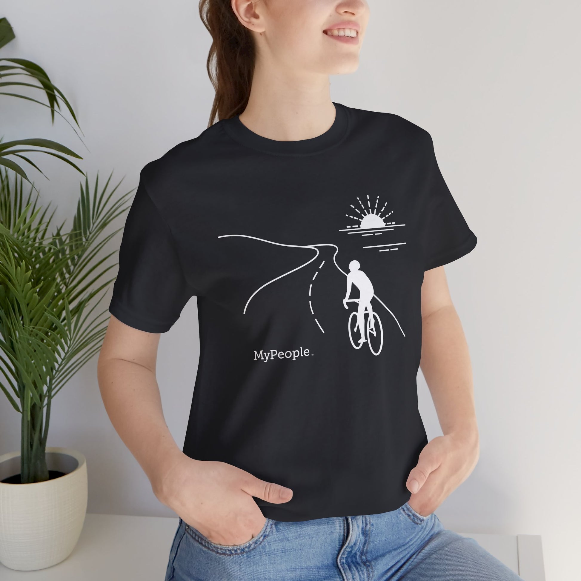 Person wearing a unisex t-shirt showing the front view with the MyPeople Cycling line illustration.