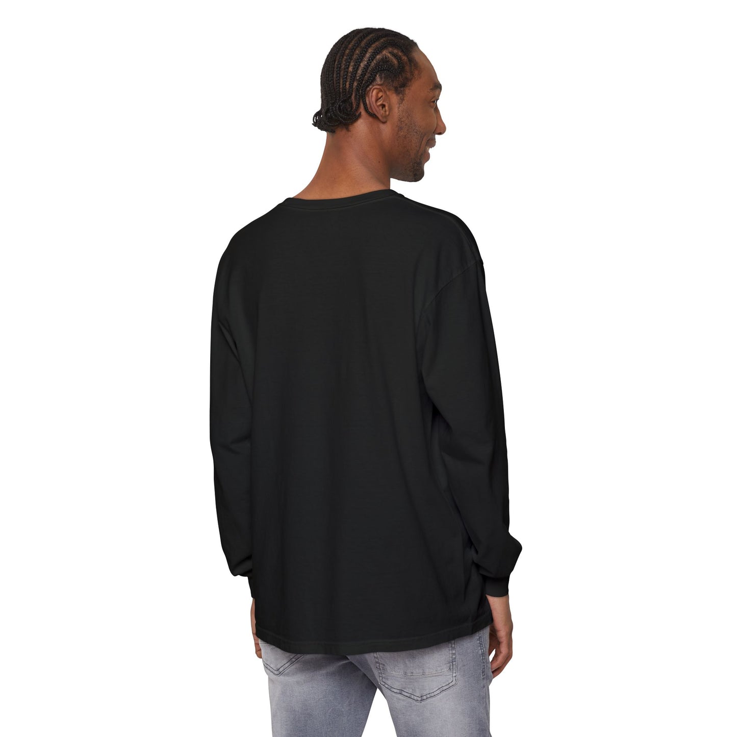 Person wearing a unisex long-sleeve shirt showing the back view with no design.