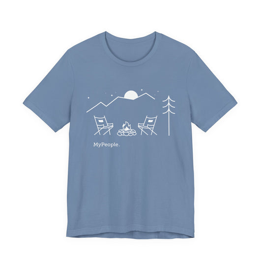Line illustration of two chairs by a campfire under a tree with mountains and a night sky, with the word MyPeople underneath on a unisex garment.