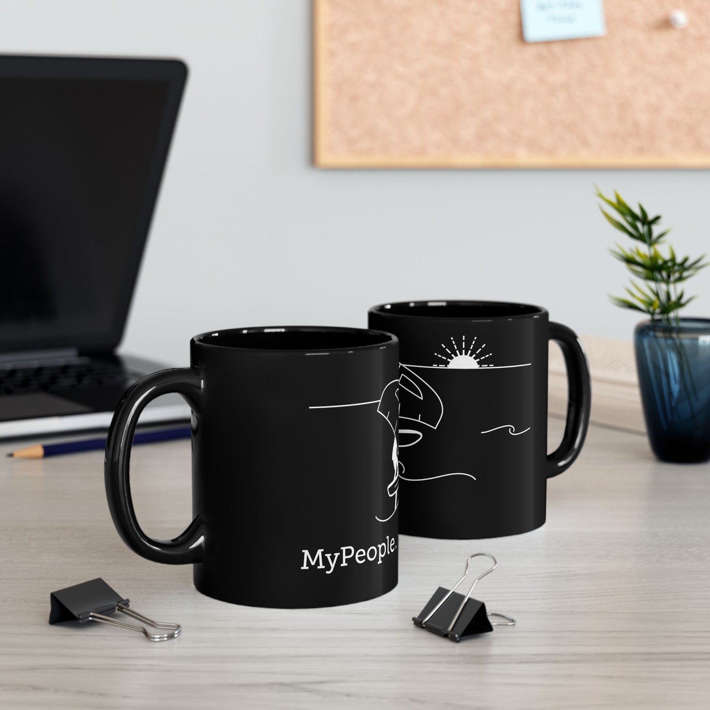 Two ceramic mugs featuring the MyPeople Wing Foiling line illustration sitting on a desk.