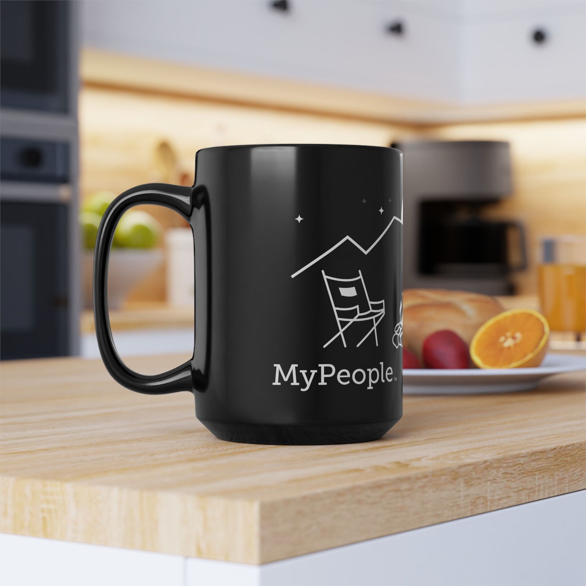 Side view of a ceramic mug with the MyPeople Campfire line illustration, handle on the left.
