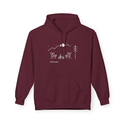 Line illustration of two chairs by a campfire under a tree with mountains and a night sky, with the word MyPeople underneath on a unisex garment.